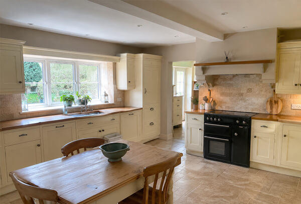 Kitchen cupboard edges and handle areas before painting in Dunstable