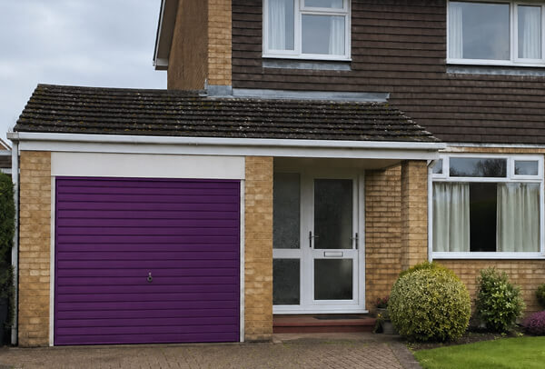 Aluminium garage door in Luton after spraying, with a crisp modern colour