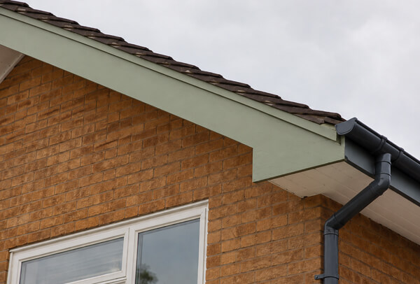 Bargeboards gutters and downpipes in Oxford after exterior painting
