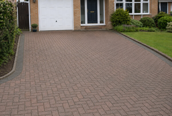 Block paving driveway in Bedford after cleaning with the joints and surface looking tidier