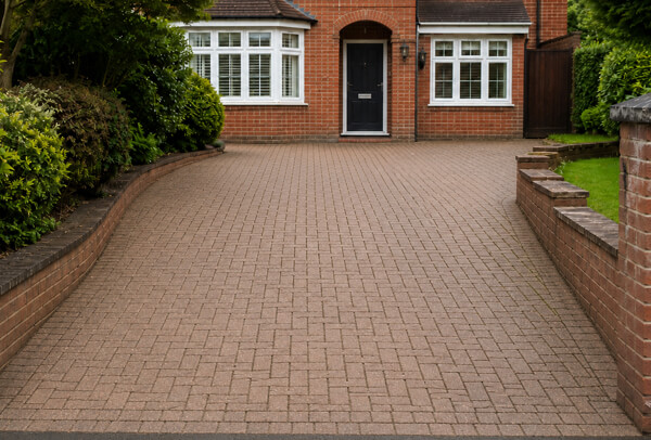 Driveway entrance in Bedford after cleaning with a clearer and more welcoming finish