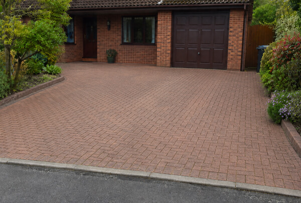 Driveway in Bedford after cleaning with a brighter and more cared for appearance