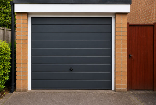 Garage door in Bedford after painting, with a cleaner and smarter colour
