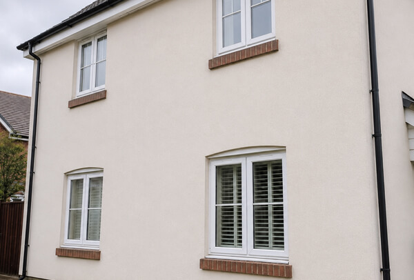 Bedford exterior wall after cleaning around sills, ledges and gutter areas
