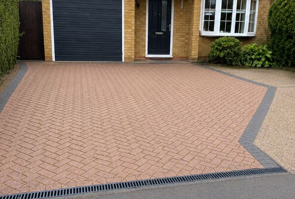 Driveway surface in Bedford after cleaning with a fresher and cleaner finish