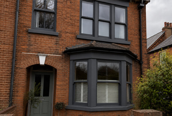 Exterior window frames in Bedford after painting, with a neater and more modern finish