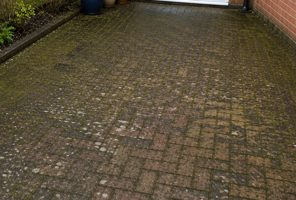 Patio in Bedford before professional pressure washing