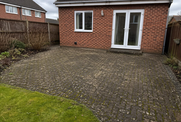 Patio in Luton before professional jet washing