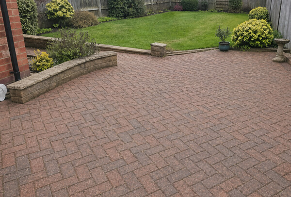 Block paving patio in Northampton after cleaning, with a much cleaner more even surface