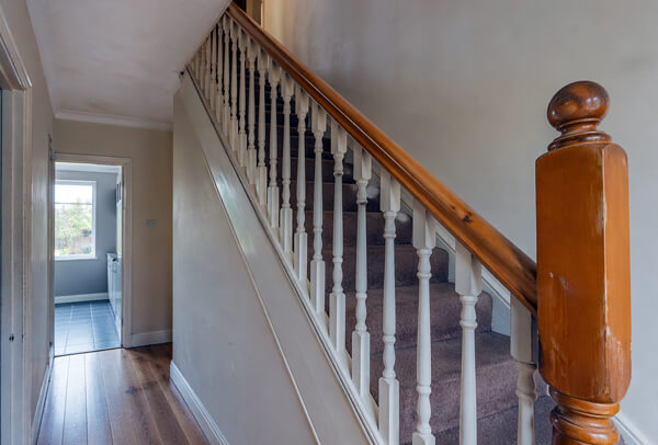 Ceilings and woodwork in Northampton before painting, with tired trim and dull finishes