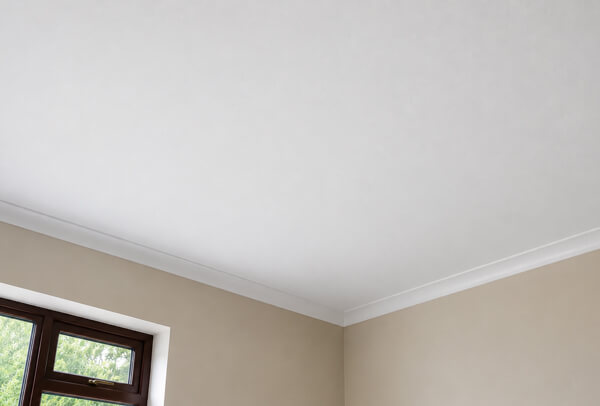 Ceiling in Bedford after painting with a clean brighter finish