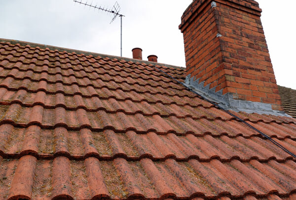 Before clay tile roof cleaning results in Milton Keynes