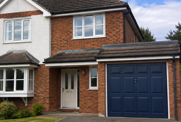 Composite garage door in Luton after painting, with a smarter modern finish