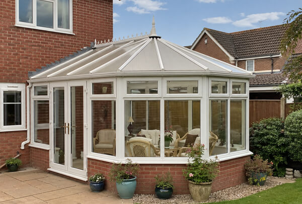 Conservatory in Luton before a frame colour change with an outdated exterior finish
