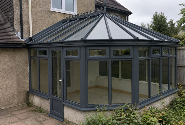 Conservatory roof bars and frames after painting in Dunstable