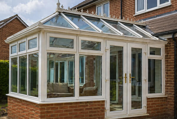 Luton conservatory before painting with older white uPVC frames ready to be updated