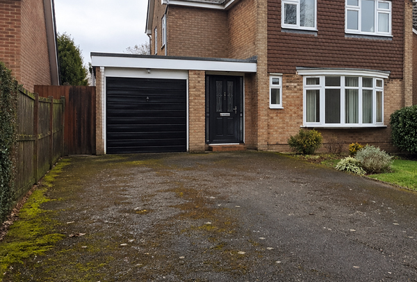 Driveway in Northampton before a professional cleaning transformation