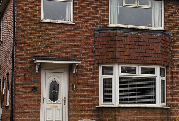 Exterior wall before house washing in Milton Keynes