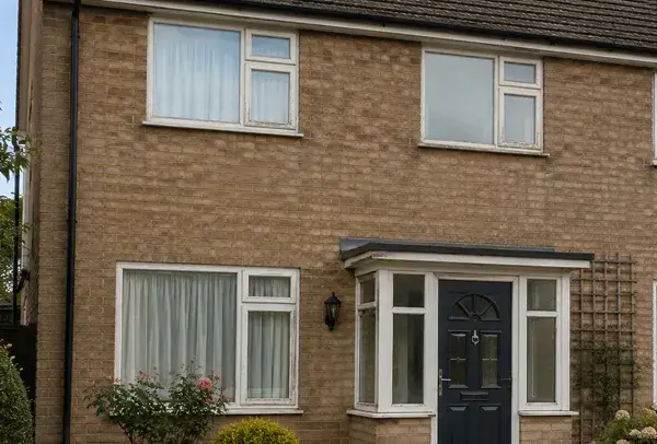 House window frames before painting with a tired exterior appearance