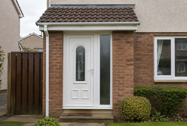 External door before painting, showing a faded surface ready for a new finish