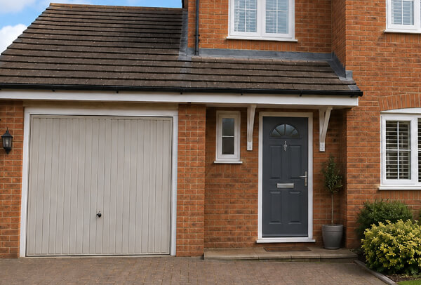 Front door before painting, with a colour that does not match the surrounding exterior features