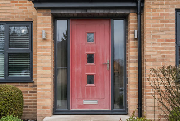 Front door in Luton before painting, not matching the windows, garage door or exterior trims