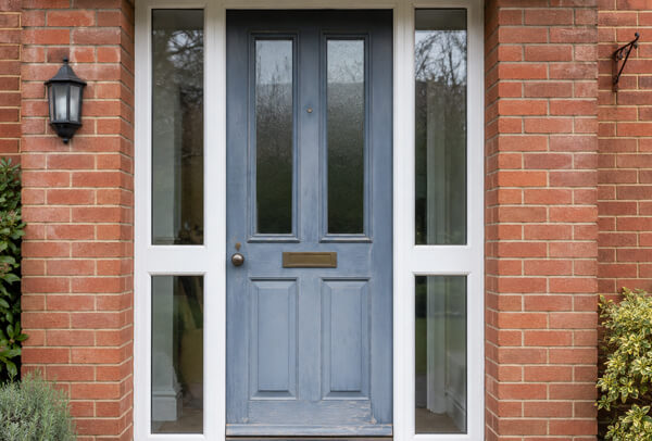 Front door before preparation, ready to be cleaned, masked and refinished