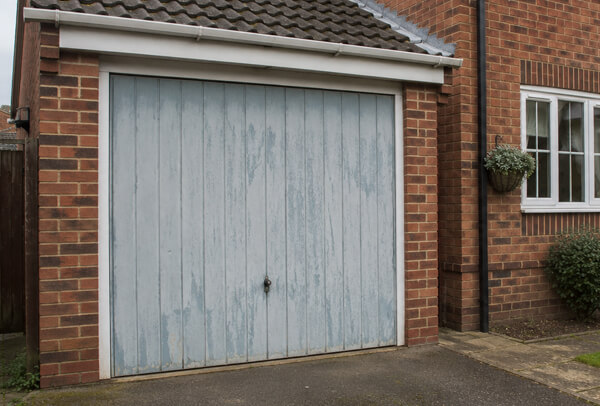 Garage door before painting for an NN1 case study
