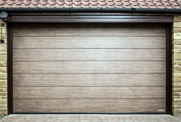Garage door before painting transformation in Milton Keynes