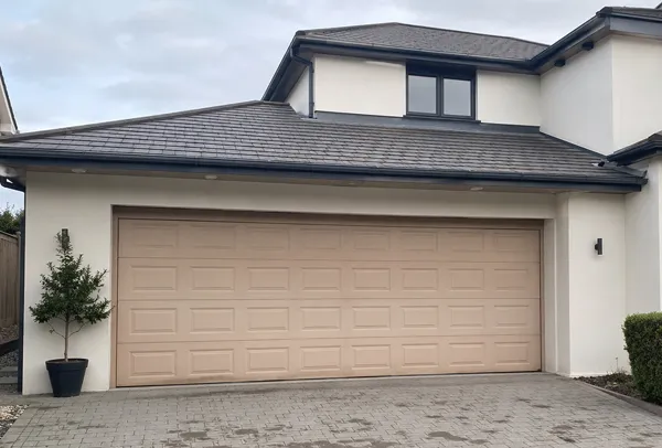 Tired garage door before being refreshed
