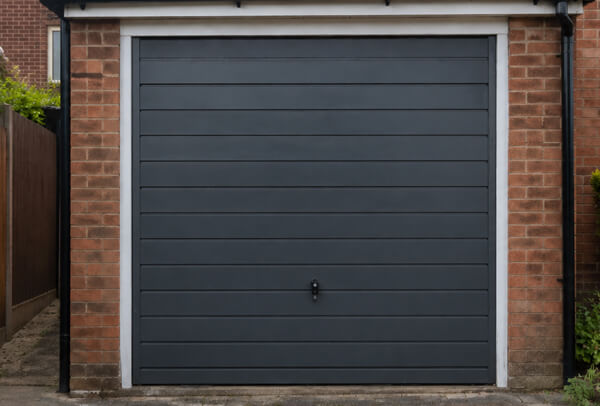Garage door in Luton after repainting, with a fresh modern finish