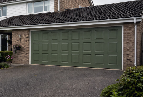 Garage door in Northampton after painting, with a cleaner and more modern appearance