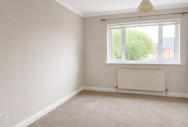 Bedroom wall in Hemel Hempstead after repainting with a smooth modern finish