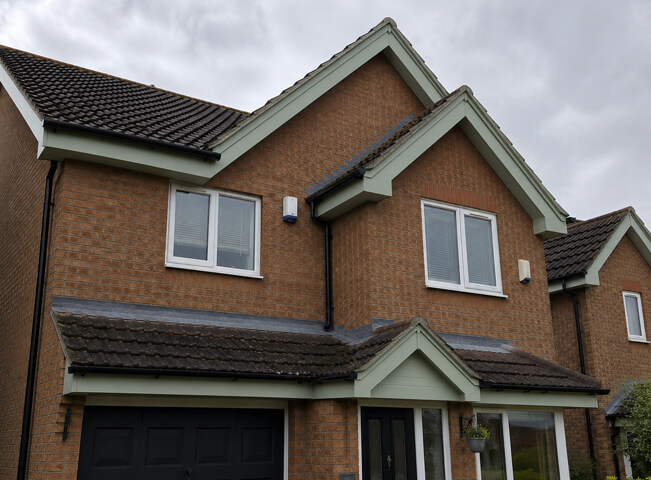 Bargeboard gutter and downpipe after painting in Hemel Hempstead with a smart finish