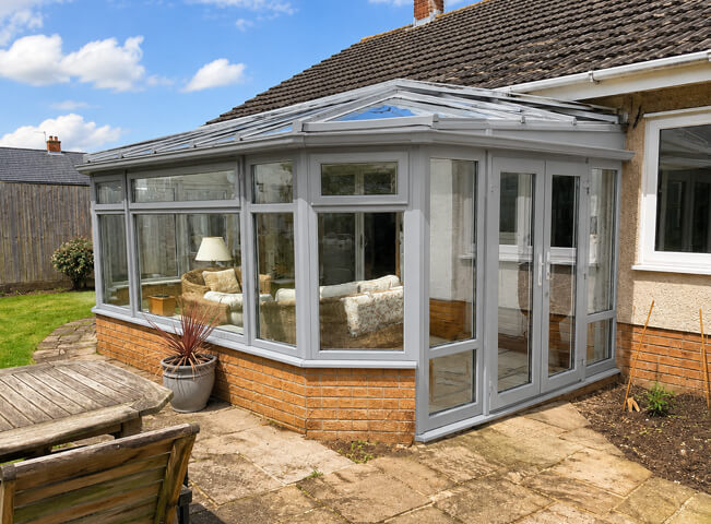 Conservatory after painting with neat frame lines around the glass
