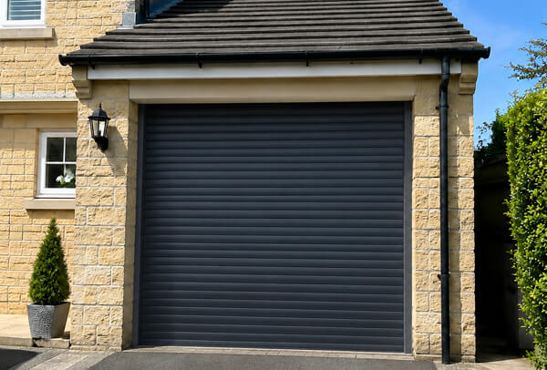 Garage door after repainting viewed from the driveway