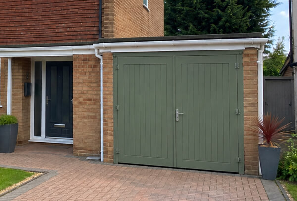 Garage door after colour change with a modern shade for the property