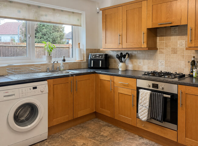 Kitchen cabinets before repainting in a Hemel Hempstead home