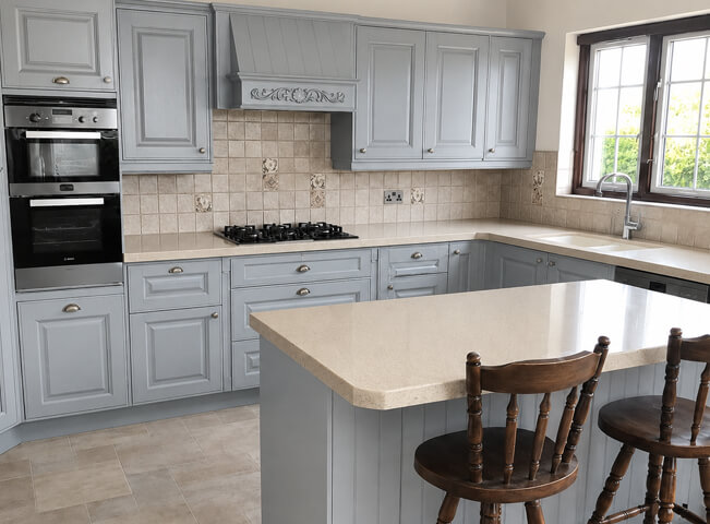 Kitchen cabinets after being assessed and professionally repainted