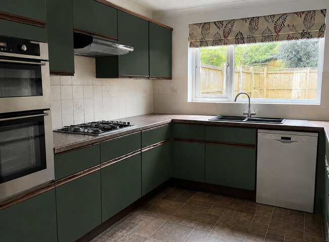 Kitchen after cabinet painting with a colour chosen for the room