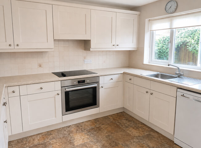 Kitchen cabinet door surface after preparation and repainting