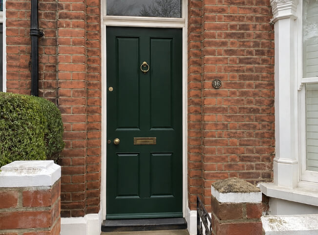 Entrance door after repainting with a neat refreshed finish