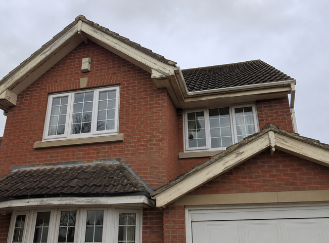 Hemel Hempstead roofline before quote with fascias soffits gutters and exterior trim to repaint