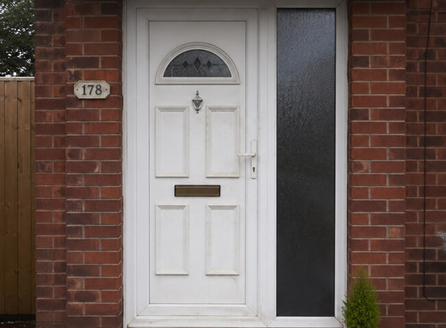 Hemel Hempstead front door before painting with a faded older finish