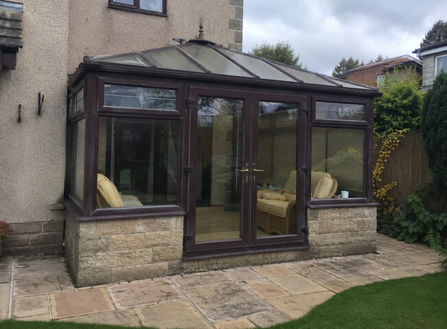 Sun faded uPVC conservatory before repainting
