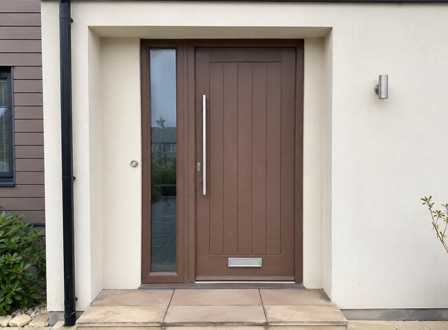 uPVC front door before spray painting with an old light coloured finish