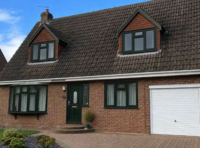 uPVC window frames after being painted in a colour that suits the house