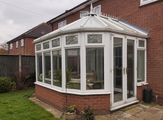 Weathered conservatory before frame painting in Hemel Hempstead