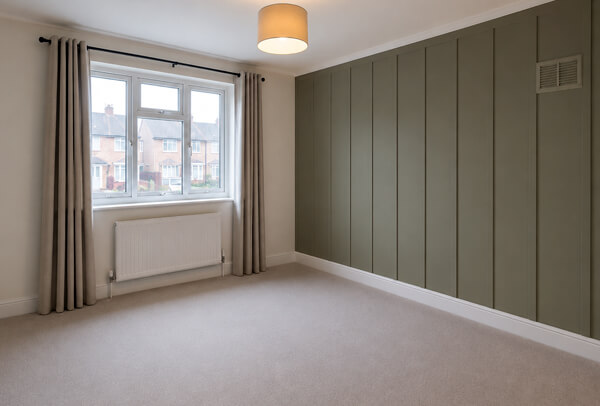 High Wycombe room after decorating with clean walls and a neat finished appearance