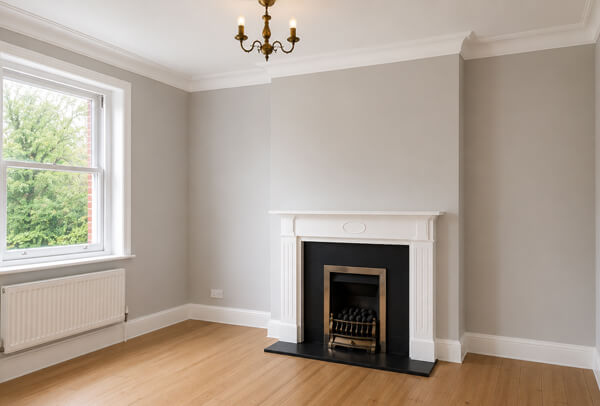 High Wycombe living room after decorating with fresh walls and neatly painted woodwork